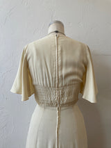 Vintage 60s/70s Cream Maxi Dress with Handkerchief Hem and Butterfly Sleeves XS - We Thieves